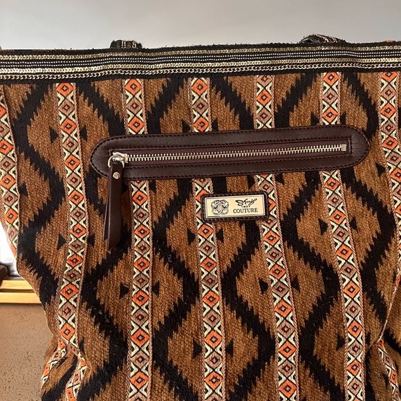 Sharif Couture
Beaded Tapestry
Tote with Leather Trim - Picture 5 of 16